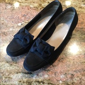 Black Salvatore Ferragamo shoes.